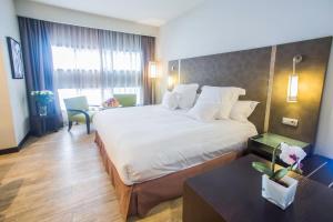 Postel nebo postele na pokoji v ubytování Barceló Casablanca