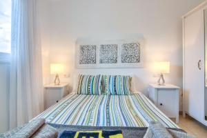 A bed or beds in a room at A3 BUNGALOW