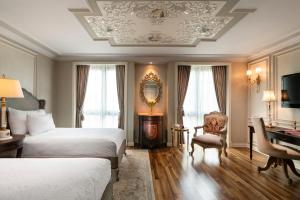 Cama ou camas em um quarto em Rixos Pera Istanbul
