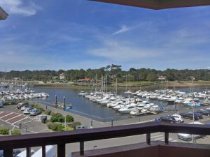 a view of a marina with boats in the water at Apartment mille sabords-6 by Interhome in Capbreton