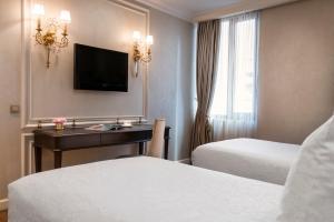 Cama ou camas em um quarto em Rixos Pera Istanbul