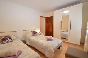 Posteľ alebo postele v izbe v ubytovaní Apartment Hrasta
