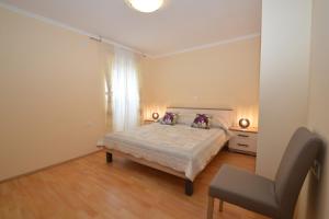 Posteľ alebo postele v izbe v ubytovaní Apartment Hrasta