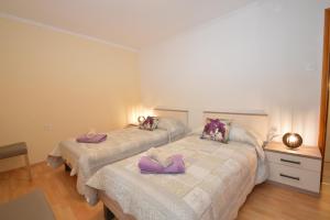 Posteľ alebo postele v izbe v ubytovaní Apartment Hrasta