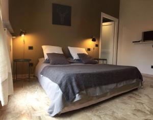 Кровать или кровати в номере Il Contrabbasso