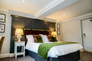 Llit o llits en una habitació de Arrow Mill- Brunning and Price