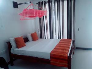 Katil atau katil-katil dalam bilik di Man Guest Polonnaruwa