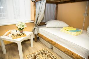 Cama ou camas em um quarto em Lenin Hostel