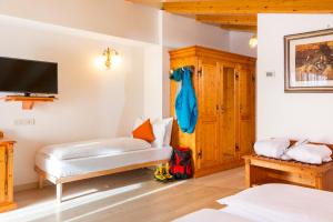 Voodi või voodid majutusasutuse Hotel Bonapace ***S toas