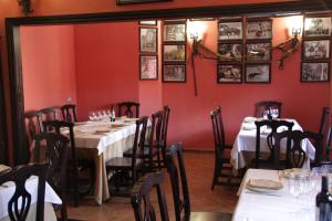 Restoranas ar kita vieta pavalgyti apgyvendinimo įstaigoje Hostal Pechi