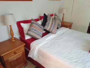 A bed or beds in a room at 1010 Clifton bnb