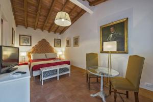 Un pat sau paturi într-o cameră la Drom Florence Rooms & Apartments