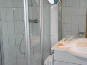 Koupelna v ubytování Hotel Winzerverein
