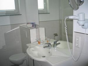 Koupelna v ubytování Hotel Winzerverein