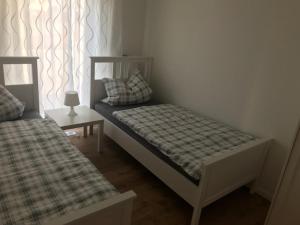 Llit o llits en una habitació de Ferienhaus Stricker