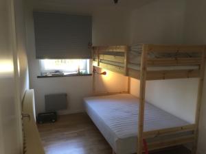 Postel nebo postele na pokoji v ubytování Fjällhus 1