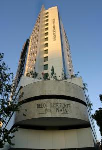 a large building with a clock on the front of it at Belo Horizonte Plaza in Belo Horizonte