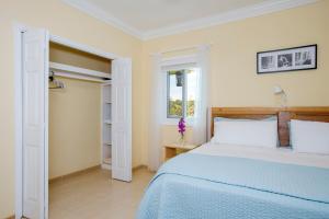 Voodi või voodid majutusasutuse Sir Charles Guest House toas
