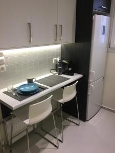 Kuchyň nebo kuchyňský kout v ubytování El Pacífico + 16 fotografií