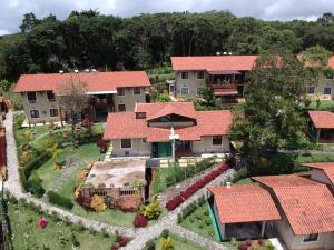 a model of a house with a garden at Guaramiranga Apart Monte Verde in Guaramiranga