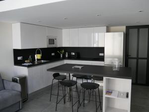 Η κουζίνα ή μικρή κουζίνα στο LOFT chic et moderne, déco industrielle