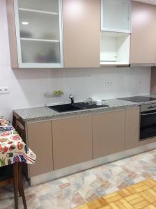 Kuchyň nebo kuchyňský kout v ubytování Casa Gonçalves