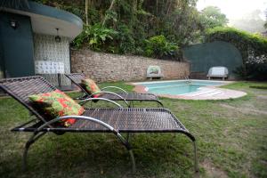 The swimming pool at or close to Rio Boutique Suites
