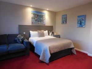 Katil atau katil-katil dalam bilik di Cullen Bay Hotel