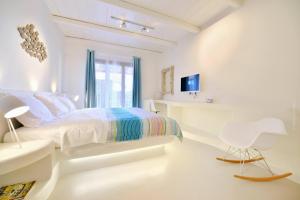 TV a/nebo společenská místnost v ubytování Villa Galatia by Thalassa Residence Mykonos