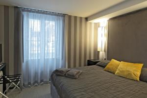 Imbriani Guest House tesisinde bir odada yatak veya yataklar