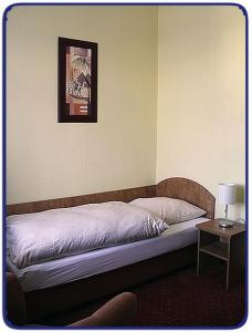 Postel nebo postele na pokoji v ubytování Hotel Holzhauer