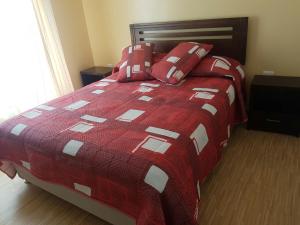Łóżko lub łóżka w pokoju w obiekcie Cabañas Siete Tazas