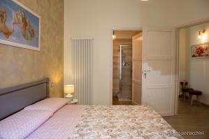Postel nebo postele na pokoji v ubytování La casa di Primo + 10 fotografií
