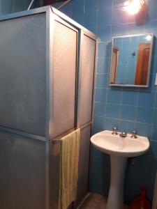 Kylpyhuone majoituspaikassa Apartamento Temporada Amazonas