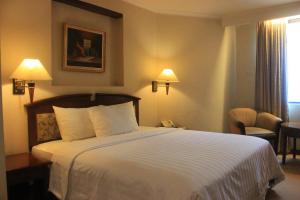 Letto o letti in una camera di Grand Arkenso Park View