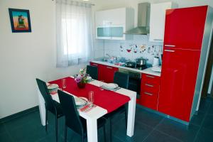 Kuchyň nebo kuchyňský kout v ubytování Apartments 1234