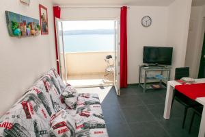 TV a/nebo společenská místnost v ubytování Apartments 1234