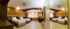 Postel nebo postele na pokoji v ubytování Hotel Grace Majestic + 21 fotografií