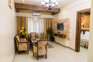 TV a/nebo společenská místnost v ubytování Hotel Grace Majestic