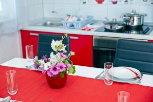 Kuchyň nebo kuchyňský kout v ubytování Apartments 1234