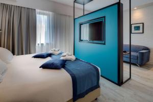 Postel nebo postele na pokoji v ubytování Best Western Hotel Cristallo