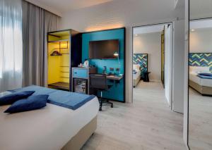 Postel nebo postele na pokoji v ubytování Best Western Hotel Cristallo