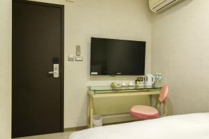 TV a/nebo společenská místnost v ubytování Shihlin Metro Home