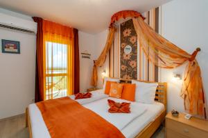 Кровать или кровати в номере Soline Bay Seashore Residence
