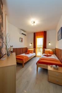 Кровать или кровати в номере Soline Bay Seashore Residence