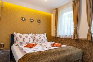 Кровать или кровати в номере Soline Bay Seashore Residence