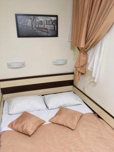 Postel nebo postele na pokoji v ubytování Viva Hotel
