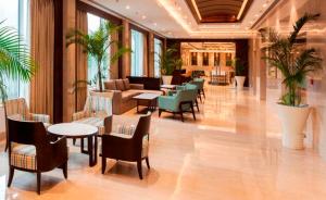 Posezení v ubytování Lemon Tree Hotel Lucknow