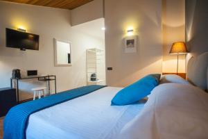 Кровать или кровати в номере Italianflat - Verona Suite