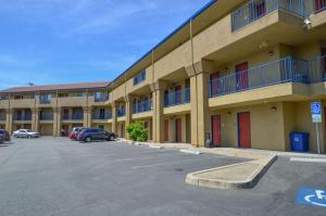 a parking lot in front of a building at Ocean Pacific Lodge in Santa Cruz